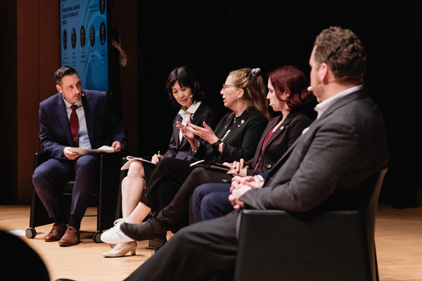 Chris Johnson moderates a panel discussion during the 6th Summit for Space Sustainability in Tokyo